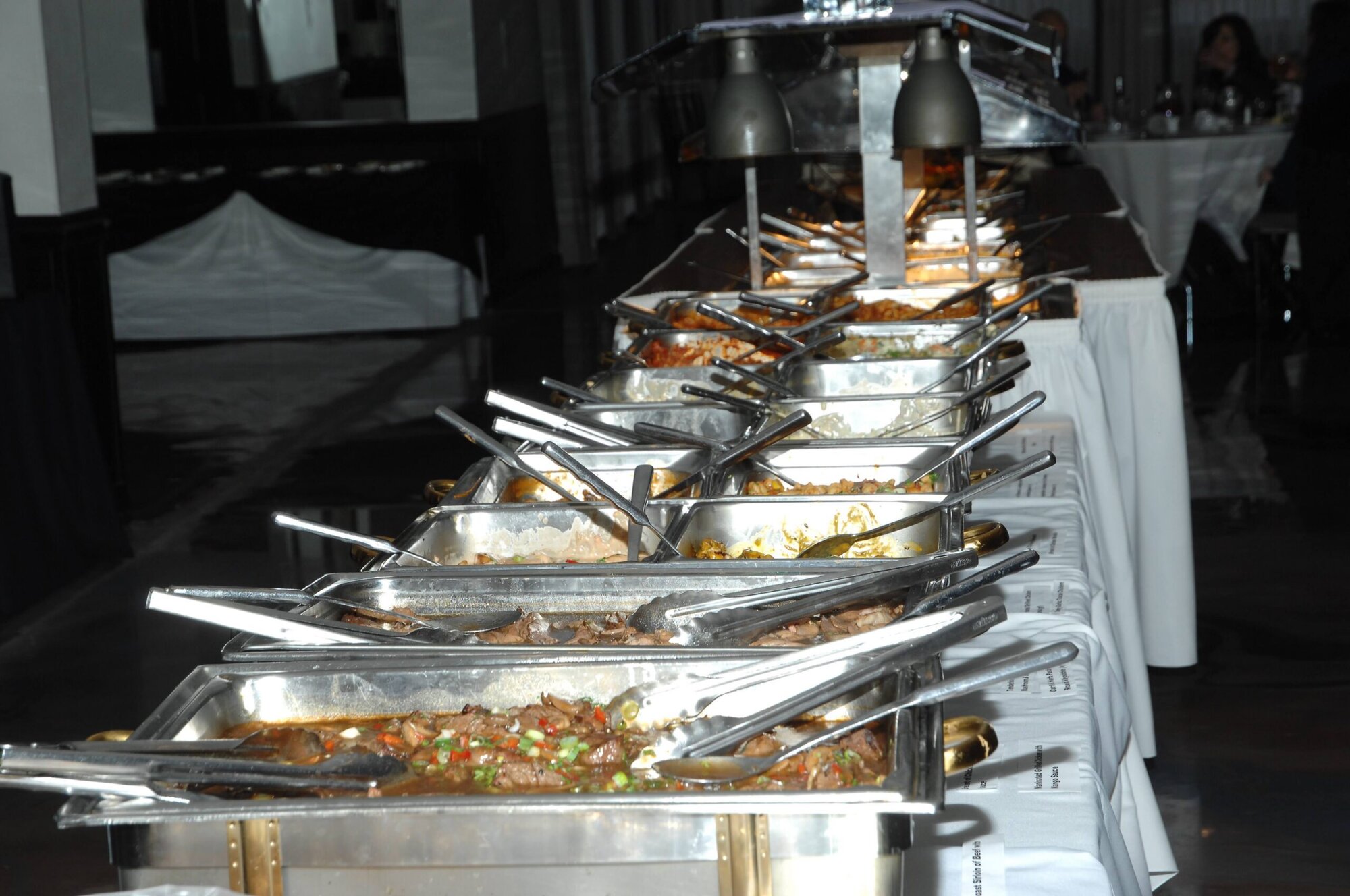 A Maravela's catering buffet line being plated