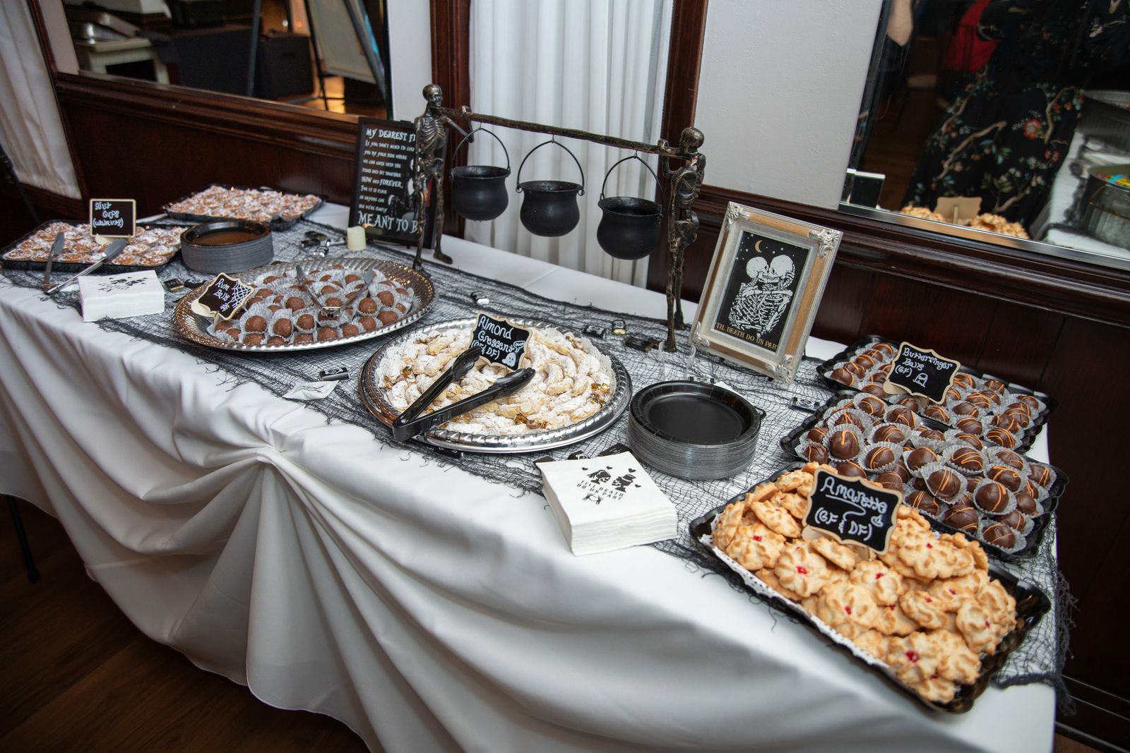 A full dessert table of scratch-made cookies and pastries at a Maravela's event