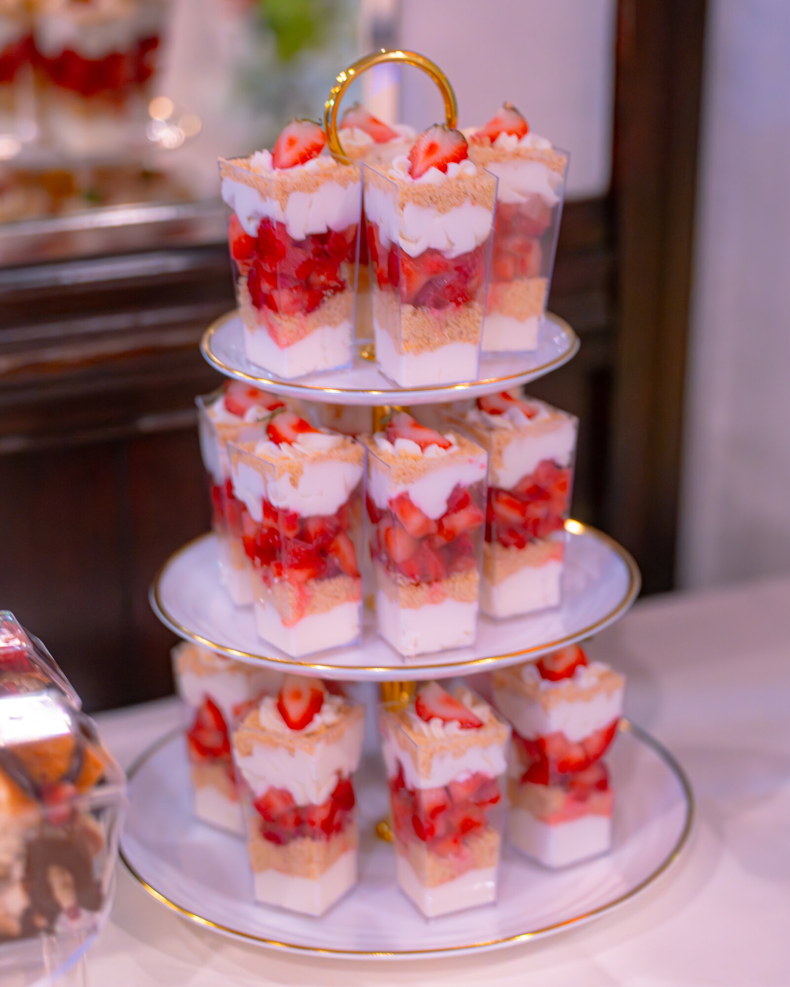 Chocolate-dipped strawberry tower at a reception